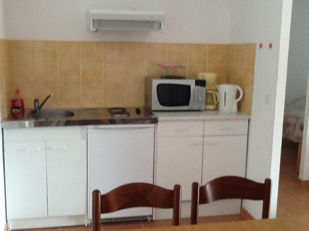 Appartements " Le Clos De La Cerisaie" Castillon-du-Gard Habitación foto